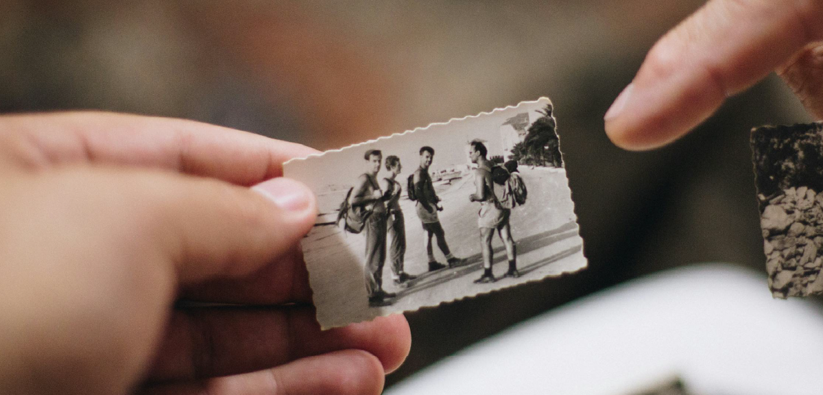 Group of colleagues greeting each other in a stylized blue duotone treatment